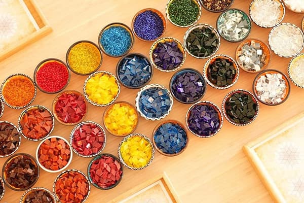 Hand-cut stained glass materials and beads